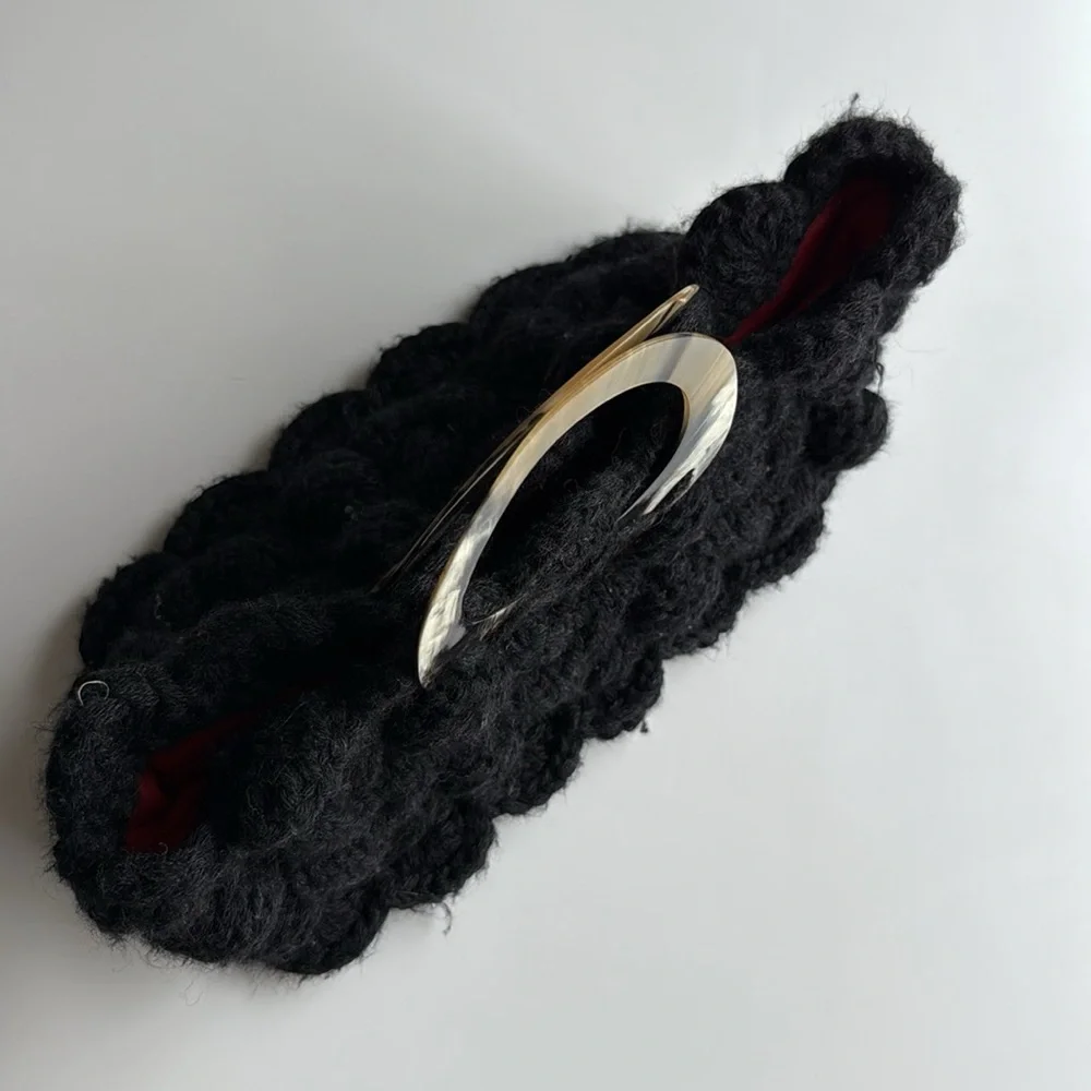 Cableknit crochet purse by Meche Correa for e bella chunky knit bag